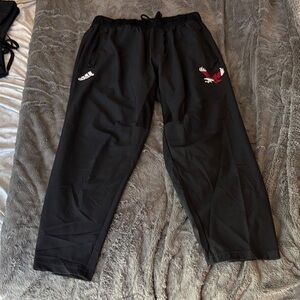 adidas Black Track Pants with White Logo and Red Graphic